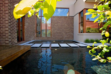 Photo of a modern pool in Melbourne.