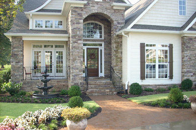 Example of a mid-sized arts and crafts home design design in Other