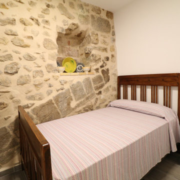 Reforma integral de casa antigua en Arnes