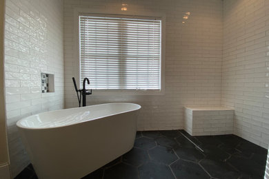 Bathroom - large cottage master bathroom idea in Nashville with a freestanding vanity
