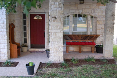 Small trendy front porch photo in Austin with a roof extension