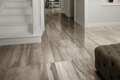 Transitional concrete floor hallway photo in San Francisco with white walls