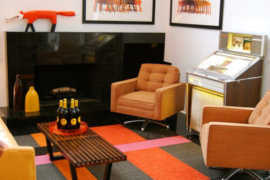 Large trendy loft-style living room photo in Other with gray walls, a standard fireplace, a tile fireplace and no tv