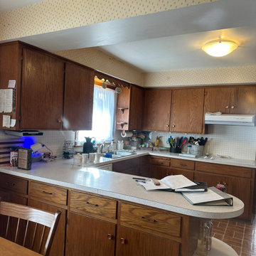 Custom Two-Toned Green and White Kitchen with Laventa Carrara Quartz Countertops