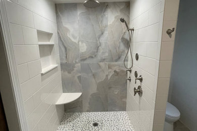 Inspiration for a coastal white tile and ceramic tile gray floor and double-sink bathroom remodel in Other with furniture-like cabinets, green cabinets, a two-piece toilet, quartz countertops, white countertops and a freestanding vanity