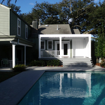 Pool, waterfall, and landscaping