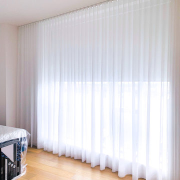 One West End- Motorized Shades and Manual Draperies