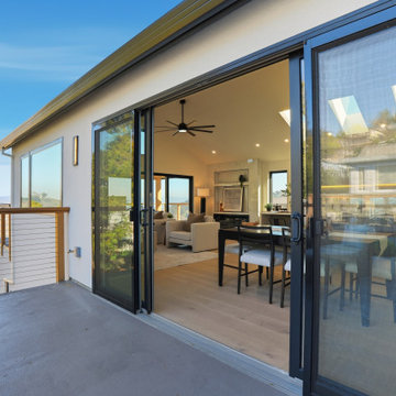 Indoor-Outdoor Dining Area with Large Sliding Glass Doors