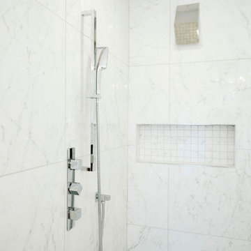 Shower niche,  silver shower head and faucet