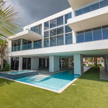 Custom Swimming Pool & Spa That Goes Underneath Part of the The House