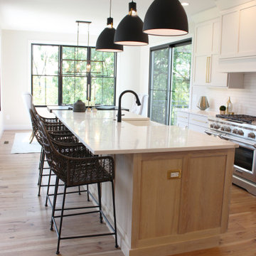 Oak, and White Kitchen with Matte Black Accents in Iowa Aspen Homes Farmhouse