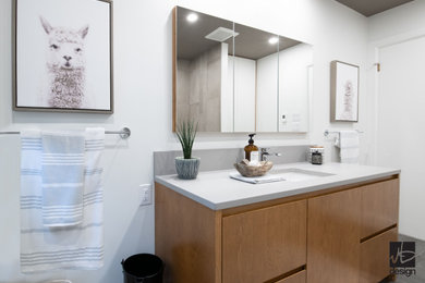 Bathroom - contemporary ceramic tile, gray floor and single-sink bathroom idea in Montreal with quartz countertops, gray countertops and a built-in vanity