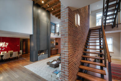 Example of a trendy staircase design in Montreal