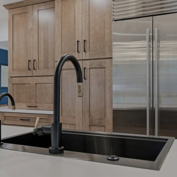 Warm Cherry Kitchen and Powder Room Remodel with Waterfall Island in Herndon, VA