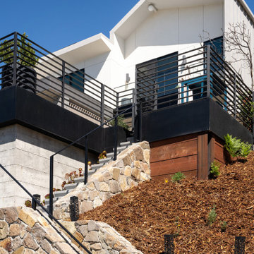 A little farm below a hillside resort-style off-the-grid view home