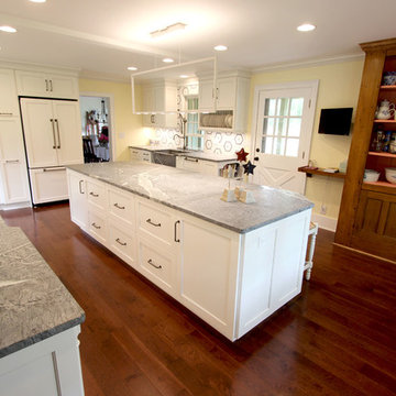 White Cabinets, Grey Countertops and Edgy Tile Backsplash