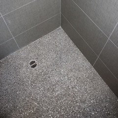 Can I put pebble tile on shower floor?