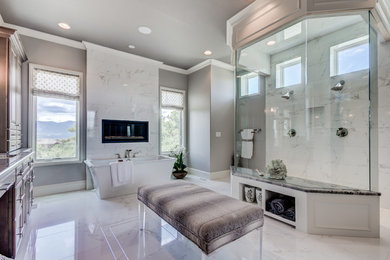 Bathroom - large traditional master white tile and porcelain tile porcelain tile and white floor bathroom idea in Denver with raised-panel cabinets, light wood cabinets, a two-piece toilet, gray walls, an undermount sink and marble countertops