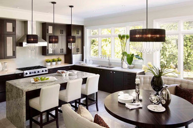 Inspiration for a mid-sized contemporary l-shaped marble floor eat-in kitchen remodel in Toronto with flat-panel cabinets, dark wood cabinets, a double-bowl sink, quartz countertops, white backsplash, stone slab backsplash, stainless steel appliances and an island