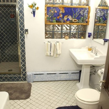 Framed Stained Glass Fish Scene in guest bathroom