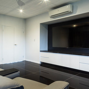 Inspiration for a modern home theater remodel in Cairns