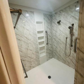 Shower Accented with a Shelf Tower & Grab Bar Supports