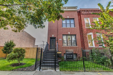 Example of a transitional exterior home design in Chicago