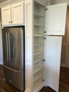 I bought a new fridge. It doesn't fit. I'm thinking of trimming the cabinet  frame, but unsure how to guarantee a straight cut unless I tear the piece  out. Any advice? 