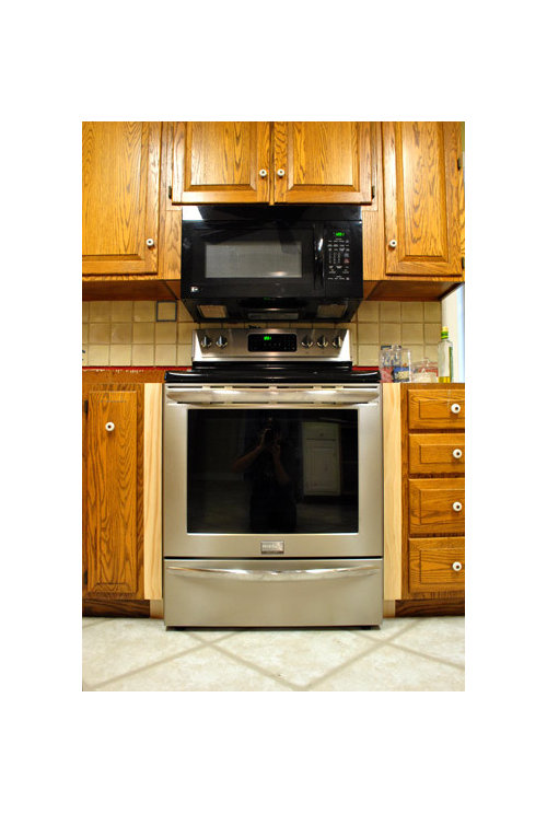 Fill gap around oven