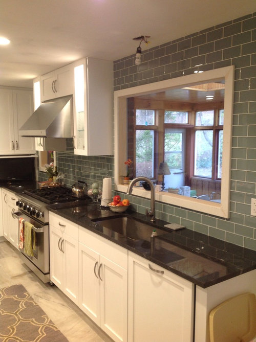 above the kitchen sink light fixture