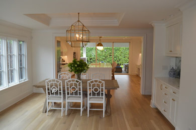Elegant light wood floor dining room photo in Seattle