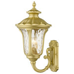 Livex Lighting - Oxford 1-Light Soft Gold Outdoor Medium Wall Lantern - From the Oxford outdoor lantern collection, this traditional cast aluminum upward facing single-light medium wall lantern design will add curb appeal to any home. It features a handsome, antique-style wall plate and decorative arm. Clear water glass casts an appealing light and lends to its vintage charm. The wall plate, arm and other details are all in a soft gold finish. With superb craftsmanship and affordable price, this fixture is sure to tastefully indulge your senses.