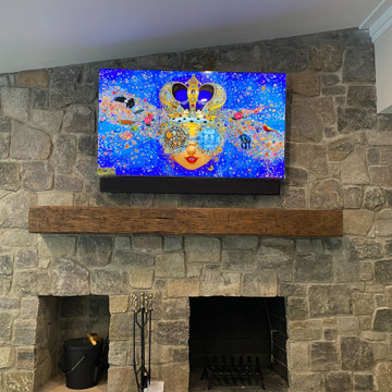 Vibrant TV Over Fireplace on Stone