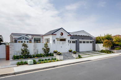 Home design - coastal home design idea in Orange County