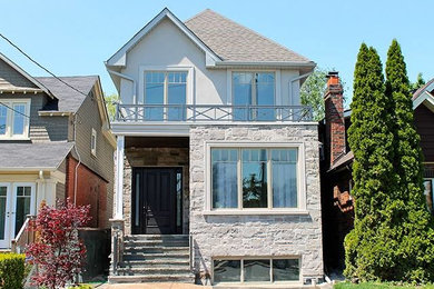 Transitional exterior home idea in Toronto