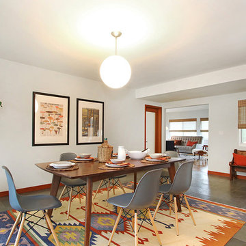 Bold Kilim Wool Rug with Eames Dining Chairs and Fiddle Leaf Fig