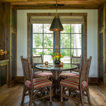 Reclaimed Wood Paneling, Flooring, and Cabinetry in a Rustic Lake House Breakfas