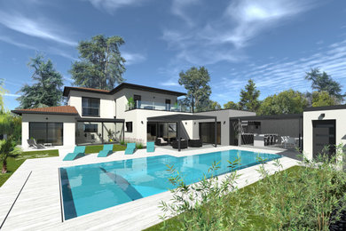 This is an example of a large contemporary home design in Lyon.