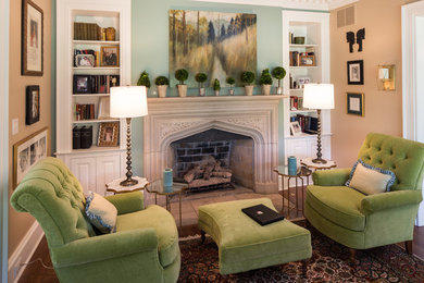 Example of a mid-sized classic formal and enclosed dark wood floor living room design in Indianapolis with beige walls, a standard fireplace, a stone fireplace and no tv