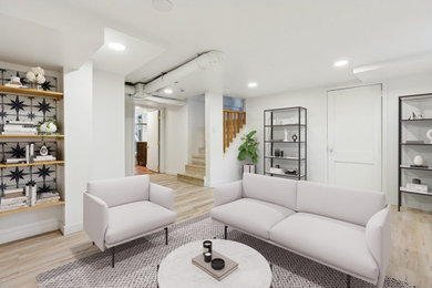 Large trendy white floor basement photo in Denver with white walls