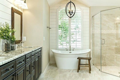 Inspiration for a large contemporary master beige tile and porcelain tile porcelain tile and gray floor bathroom remodel in Toronto with beaded inset cabinets, black cabinets, beige walls, an undermount sink, granite countertops and a hinged shower door