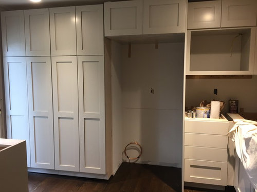 Should I keep my upper kitchen cabinets 19 3/4" above counter?