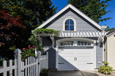 Garage - small craftsman detached one-car garage idea in Portland