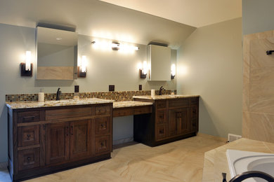 Drop-in bathtub - large transitional master beige tile drop-in bathtub idea in Other with an undermount sink, shaker cabinets, dark wood cabinets and granite countertops