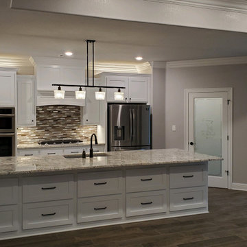 Extra drawer storage on front of island.