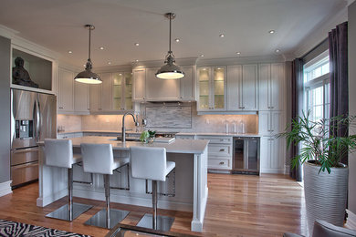 Photo of a contemporary kitchen in Toronto with stainless steel appliances.