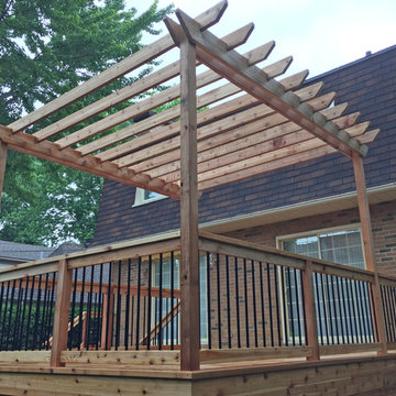 Western Red Cedar Deck with Cedar Pergola & Stone Patio & Stone Fireplace