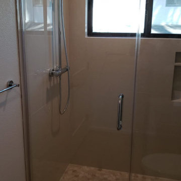 Beige Color Tiles on the Shower Backsplash
