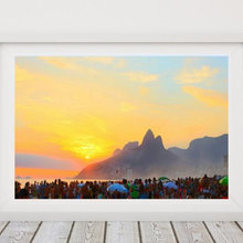 Sunset in summer at Ipanema Beach during Carnival celebrations