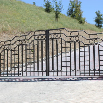 Automatic ornamental iron driveway gates